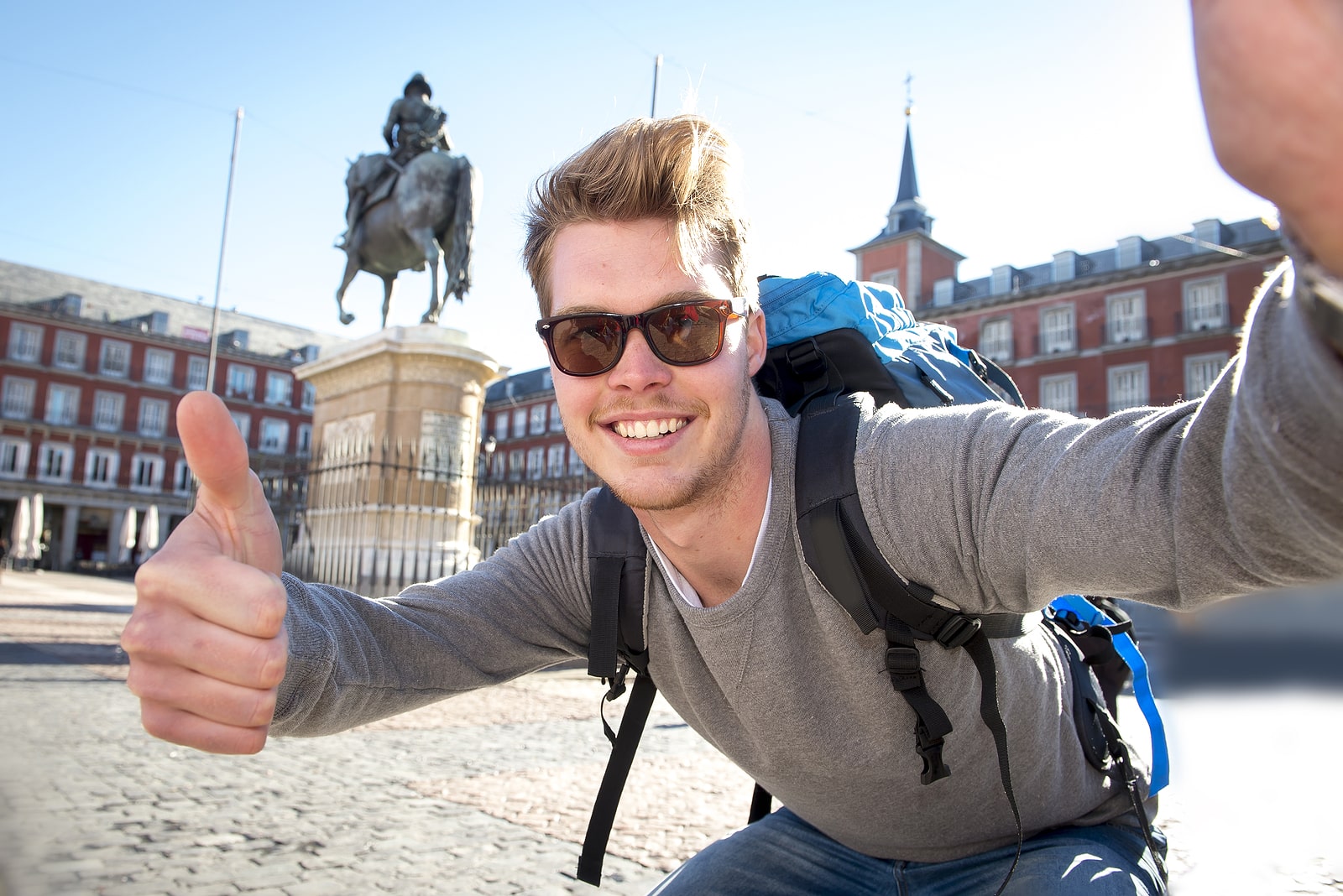 Student Backpacker Tourist Taking Selfie Photo With Mobile Phone