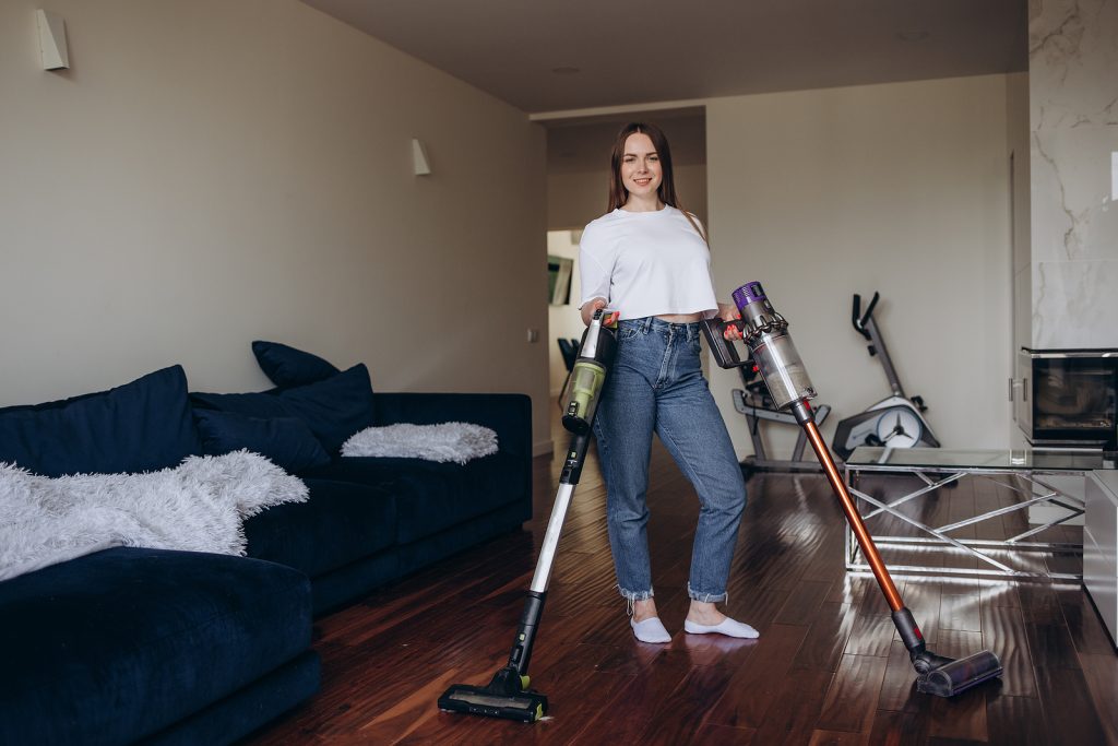 Cleaning Carpet With Vacuum Cleaner At Home