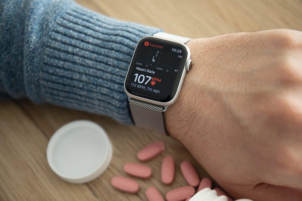 Man hand with Apple Watch Series 4 with the Heart Rate app on the screen. Apple Watch was created and developed by the Apple inc.