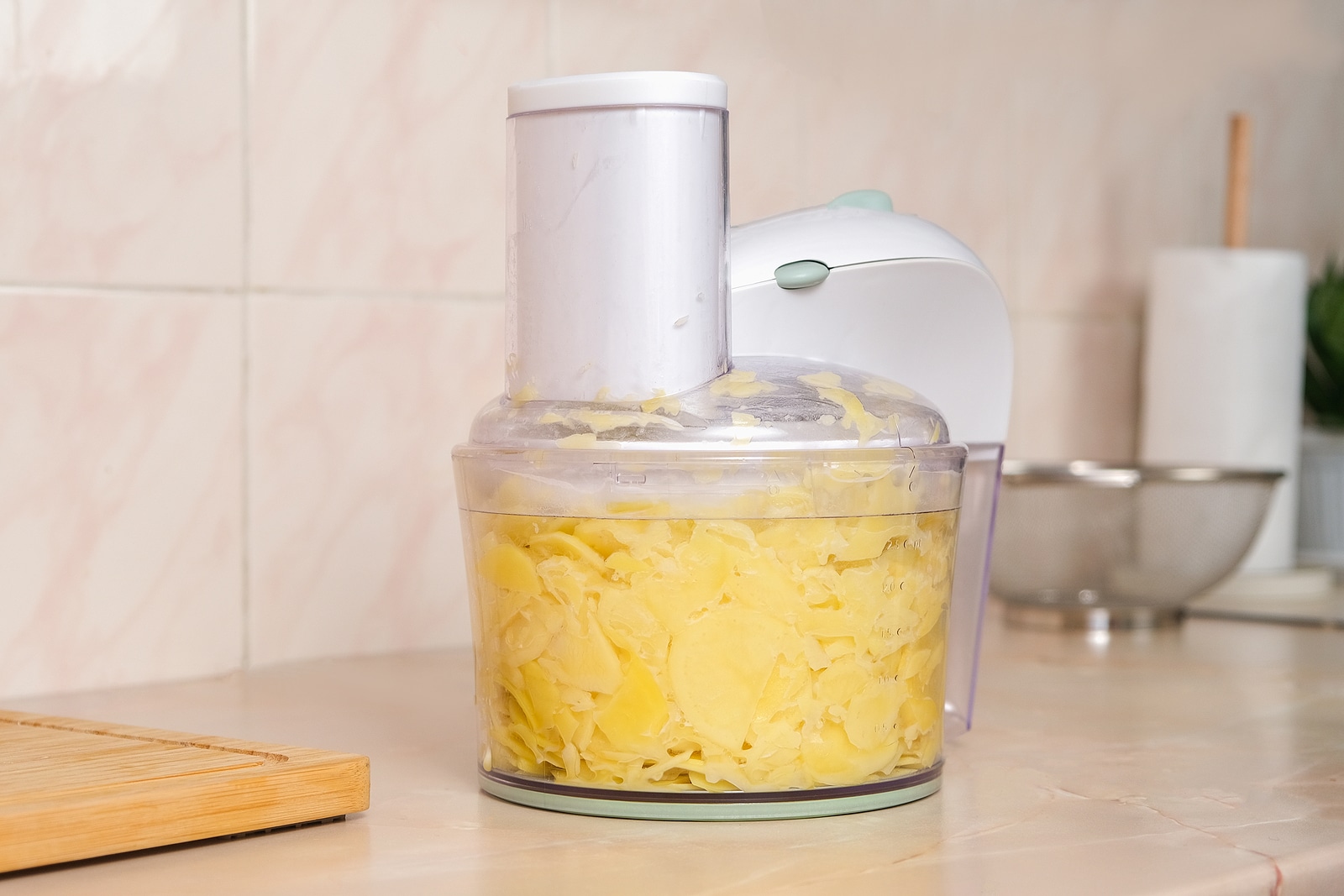 Potatoes Cut Into Thin Slices In Food Processor Preparation Pot